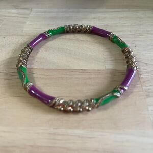 bangle bracelet burnished gold tone with purple and green enamel costume jewelry